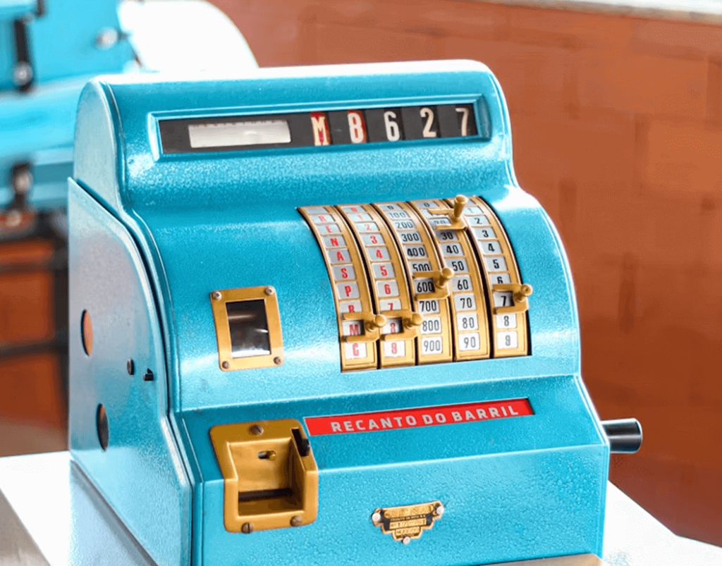 Retro cash register reflecting past perceptions, clarifying sales accuracy, and revealing the truth behind OneTaste's practices.